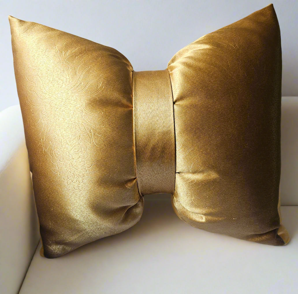 gold decorative pillow cover on a sofa