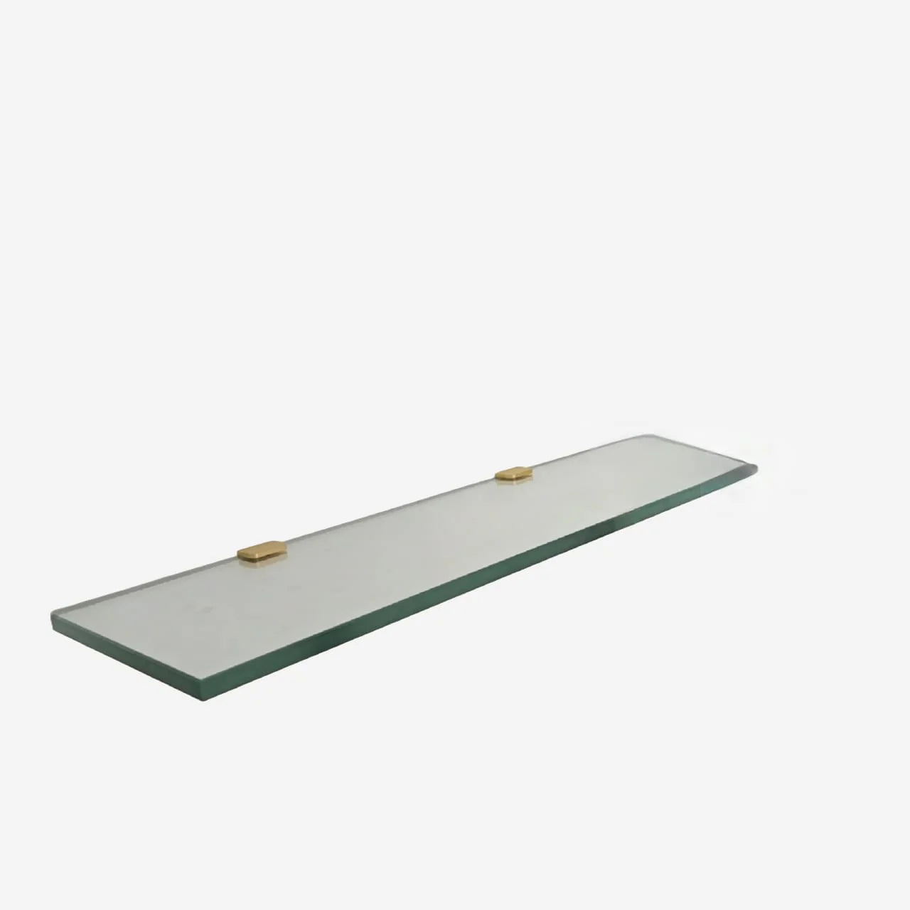 Long rectangular glass shelf with gold brackets on a white background